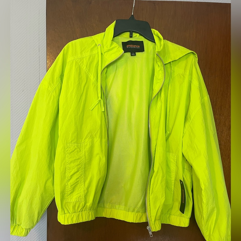 Women's windbreaker jacket with hood. Size small, lime green, new with tags